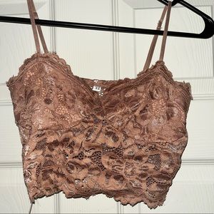 This is a laced crop top. This top has only been worn once.
